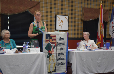 woman at podium
